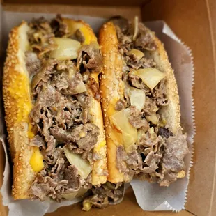 two sandwiches in a box