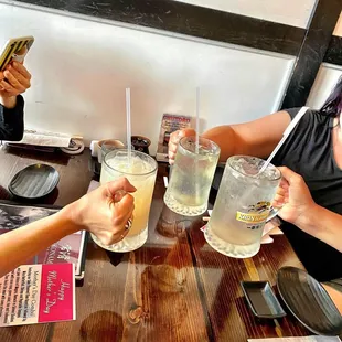 a group of people having drinks