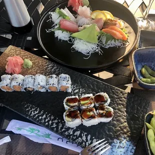 Regular Sashimi, eel roll, and spicy yellowtail roll.