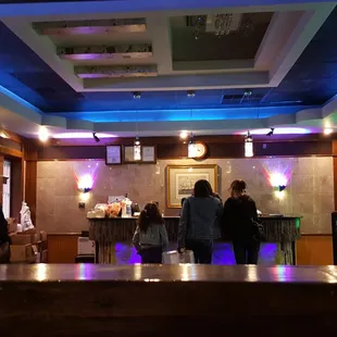 a group of people in a restaurant