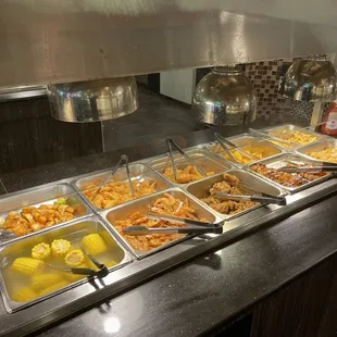 a variety of food items in a buffet