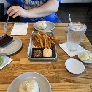 Tok Fries and Bao Buns filled with beef brisket