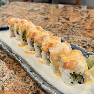 SUNSHINE ROLL - (avocado, unagi) salmon, sauce.