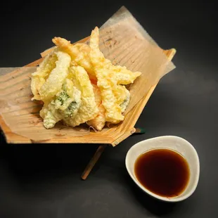 Tempura Udon - udon noodle soup, served with shrimp and vegetable tempura on the side.