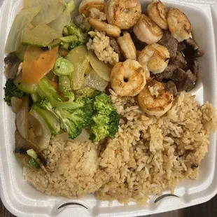Hibachi steak and shrimp with vegetables and fried rice