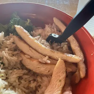 Chicken bowl, white rice and broccoli.