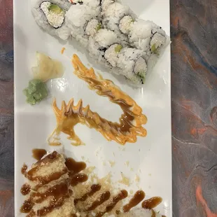 Delicious sushi with a pretty amazing little dragon design