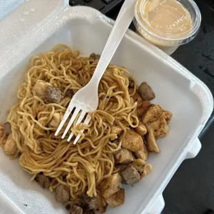Chicken and steak w/noodles. About a $15 plate.