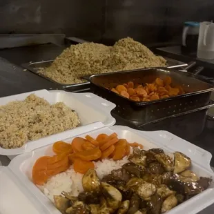 a variety of food items in trays