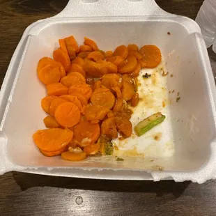 carrots and rice in a styrofoam container