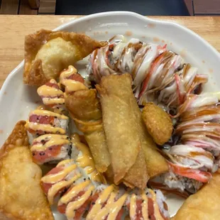 Cowboy Roll , Tuna avocado roll   2 Pieces Egg Roll  4 Pieces Crab Rangoon