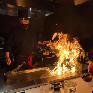 a chef cooking in a restaurant