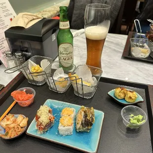 Sushi, Crab wontons, kimchi and salmon wontons.
