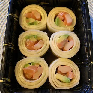Naruto Roll-- salmon, crab, avocado rolled in cucumber in vinaigrette dressing. $7.95
