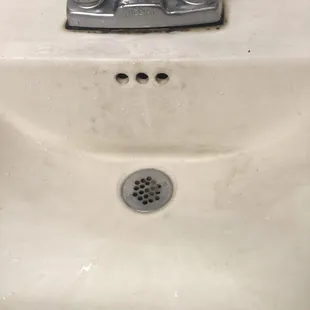 a sink with a drain