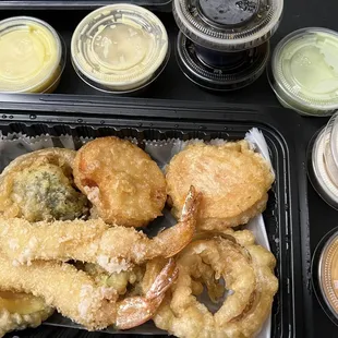 Shrimp tempura appetizer and a variety of sauces