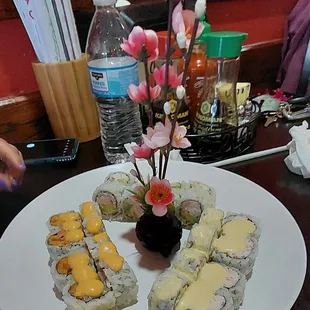 Any Three Way: Mango snow crab, spicy tuna, crunch roll with salad $12.95