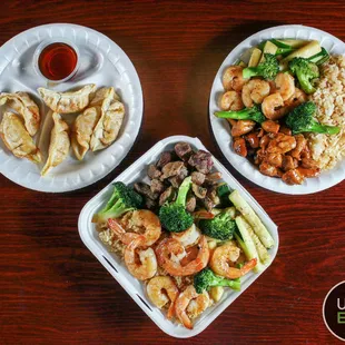 three plates of food on a table