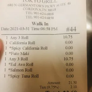 a hand holding a receipt