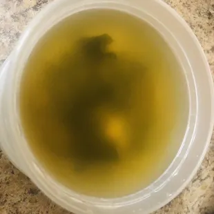 a bowl of soup and a spoon