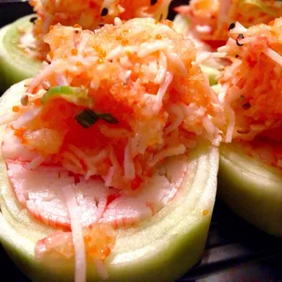 One of the specials from the board. I believe it was called &quot;Delicious Roll.&quot; Naruto topped with crab stick, crunches and green onion.