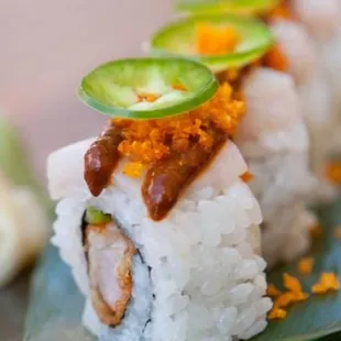 a sushi roll on a plate