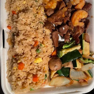 Hibachi Steak and Shrimp. Three egg rolls and a Salad.