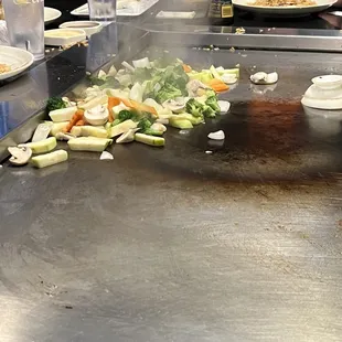 a woman cooking food