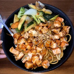 Salmon teriyaki bite bowl with noodles! BIG portion, great flavors! Cooked to perfection.