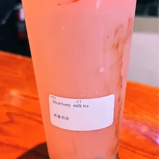 a plastic cup of bubble tea