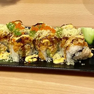 a plate of sushi on a table