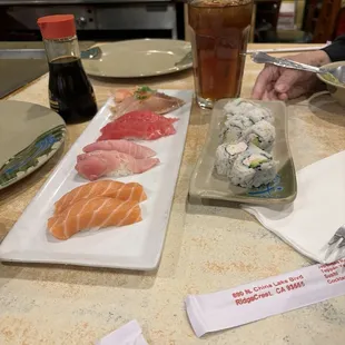 Salmon, albacore, tuna, yellowtail nigiri and California roll