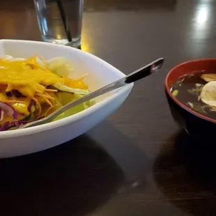 a bowl of soup and a bowl of noodles