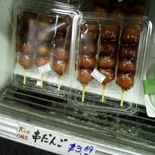 Odango! Pummelled rice balls dipped in sweet soy sauce gel on a stick