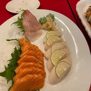 Salmon sashimi, super white tuna nigiri, and red snapper sashimi