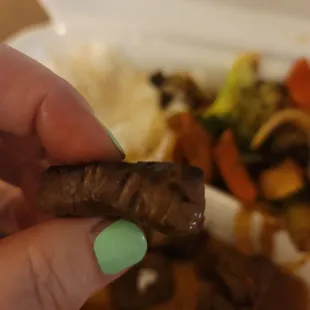 All pieces of my order were like this. Burnt, dry, tough sirloin instead of the Filet Mignon we ordered and paid for.