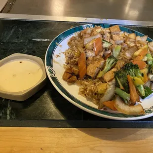 Chicken hibachi with fried rice and vegetables