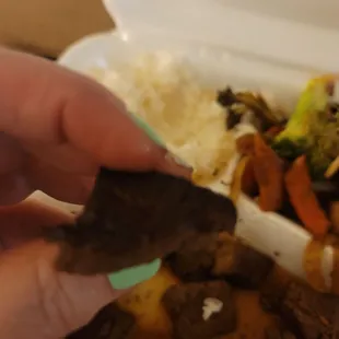 Thin cut sirloin, burnt, instead of the Filet Mignon we paid for