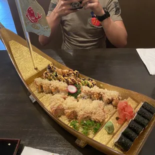 a man taking a picture of his food