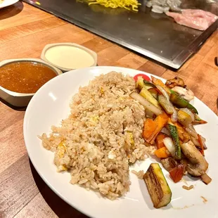 a plate of rice and vegetables
