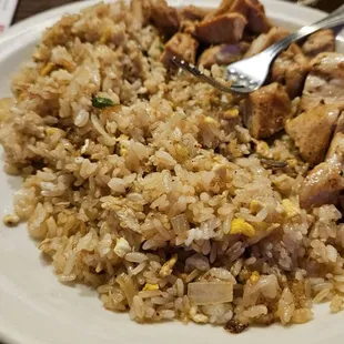 Fried rice that was dry and costs am additional $5.00