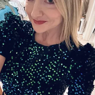 Angie T.