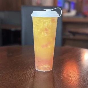a drink in a plastic cup