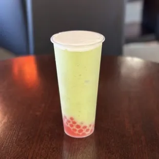 a drink in a plastic cup