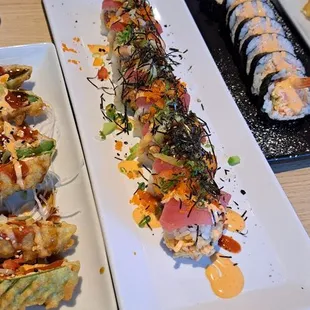 A variety of delicious sushi trays... enough to share or take home  for later, too.