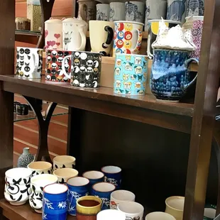 Ceramic cups on second shelf are awesome for green tea