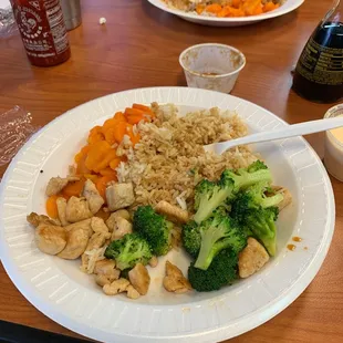 Hibachi chicken broccoli fried rice and sweet carrots