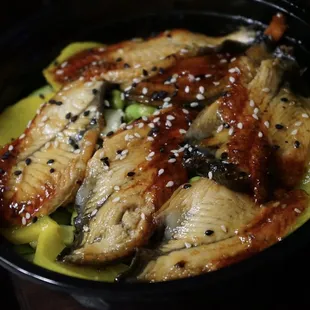 a bowl of asian food