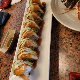 a sushi roll on a plate