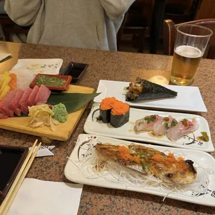 Salmon skin hand roll, Black snapper, smelt roe